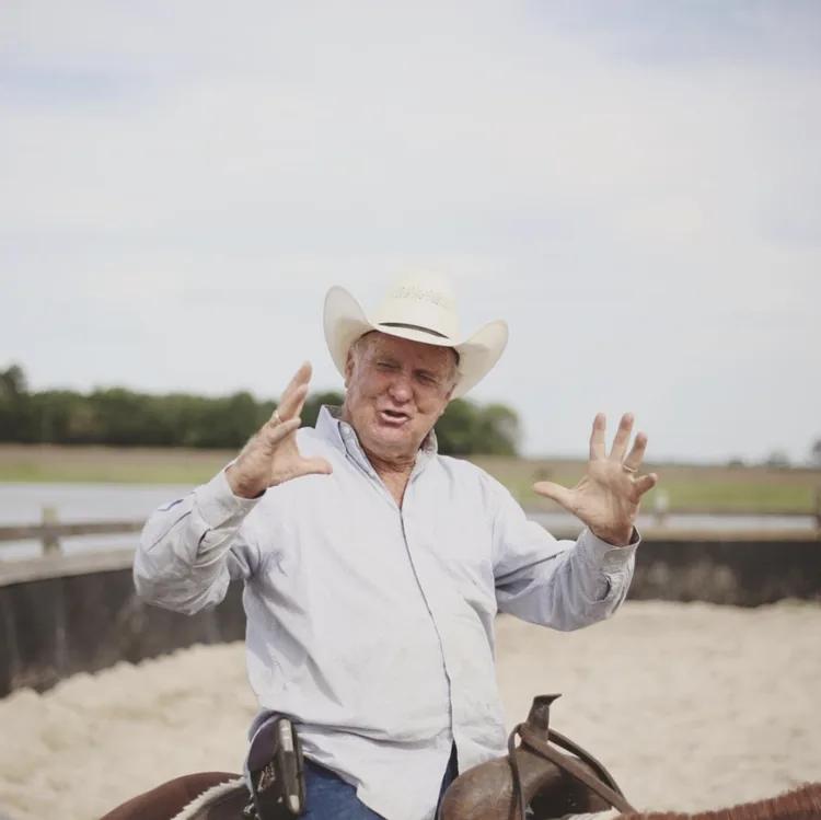 Ronnie Hodges speaking while seated on horseback